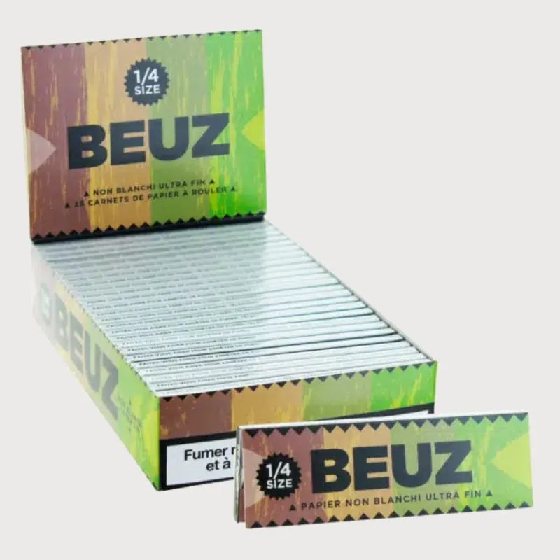 FEUILLES NON BLANCHIES 1/4 | BEUZ, ultra fines et authentiques, présentées dans une boîte colorée avec plusieurs carnets pour rouler.